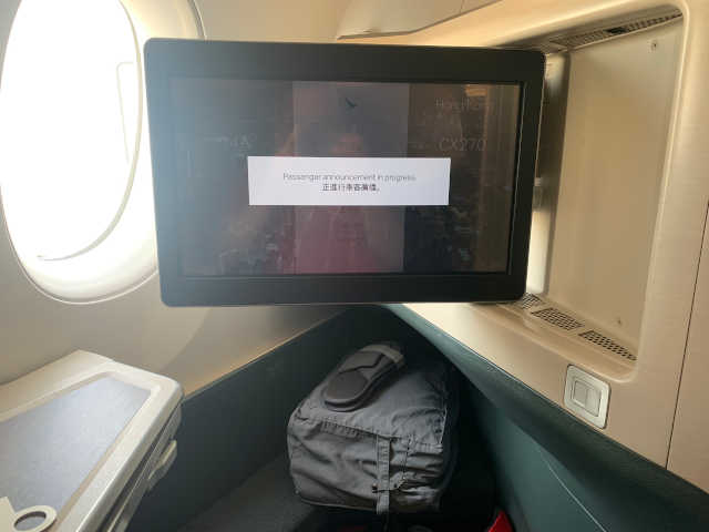Beeldscherm in business class van Cathay Pacific